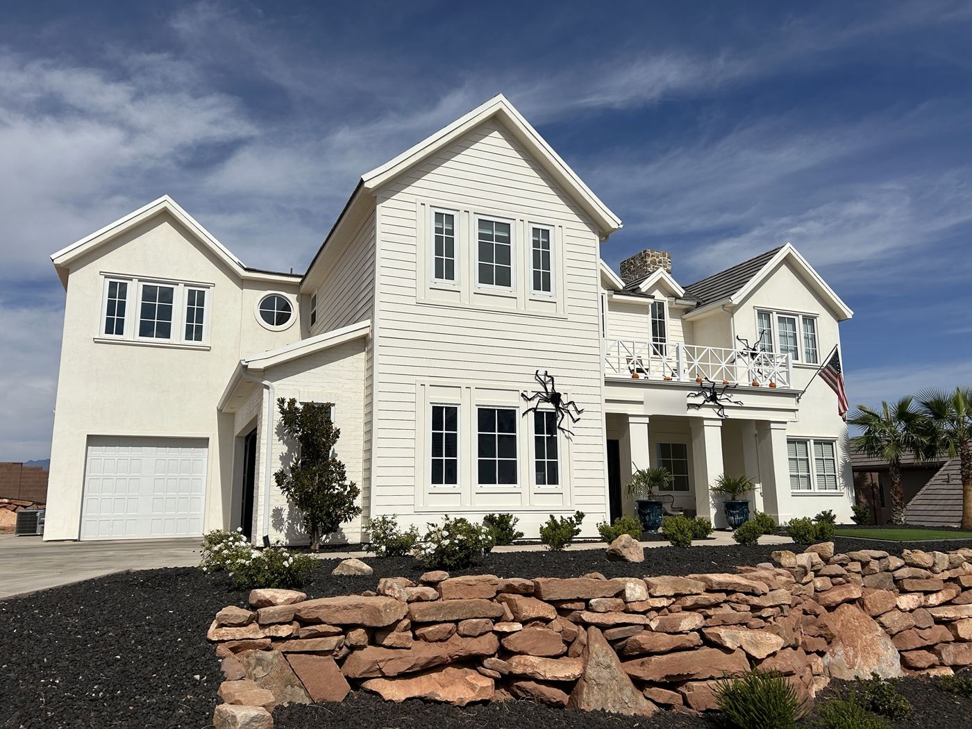White two-story home with cleaned windows in Southern Utah